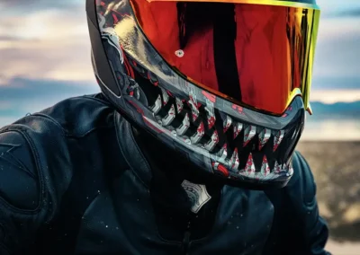 Side view of the Ruroc EOX helmet with the optional Cardo-powered Shockwave Mesh communication unit installed.