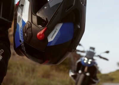 A close-up detail shot of the M-Forge™ Carbon and Aramid weave on the shell of the BMW GS Rallye Carbon helmet.