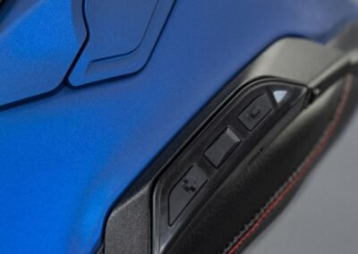 The flush-mounted Sena SRL3 communication system integrated into the side of the Shoei GT-Air 3 helmet.