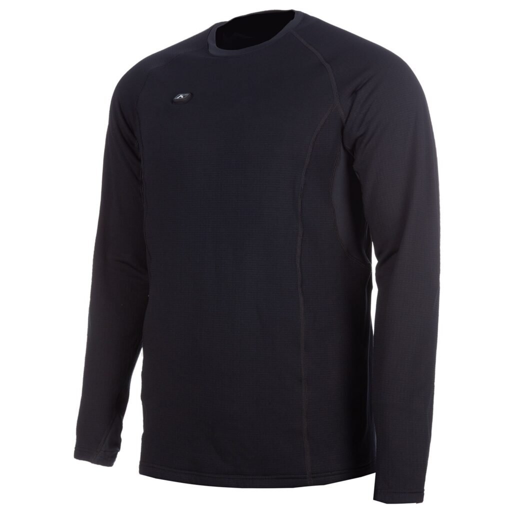 The black Klim Aggressor -1.0 eFire Heated Shirt displayed on a mannequin, highlighting the chest-mounted control button.