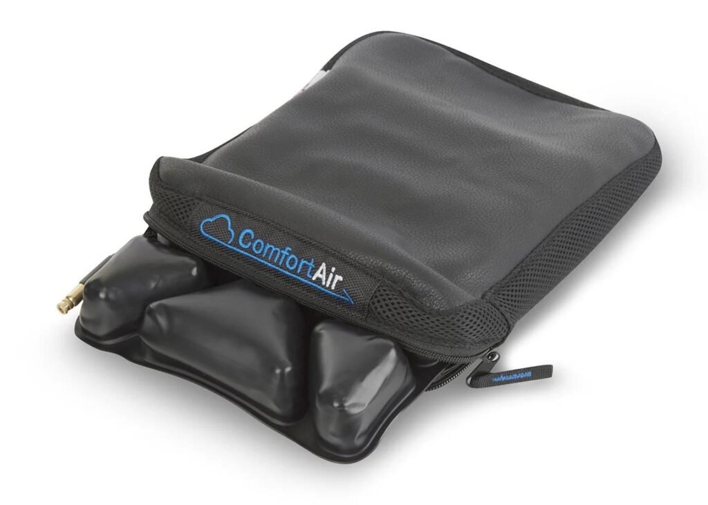 A view of the robust, integrated strap system secured underneath a motorcycle's main seat.