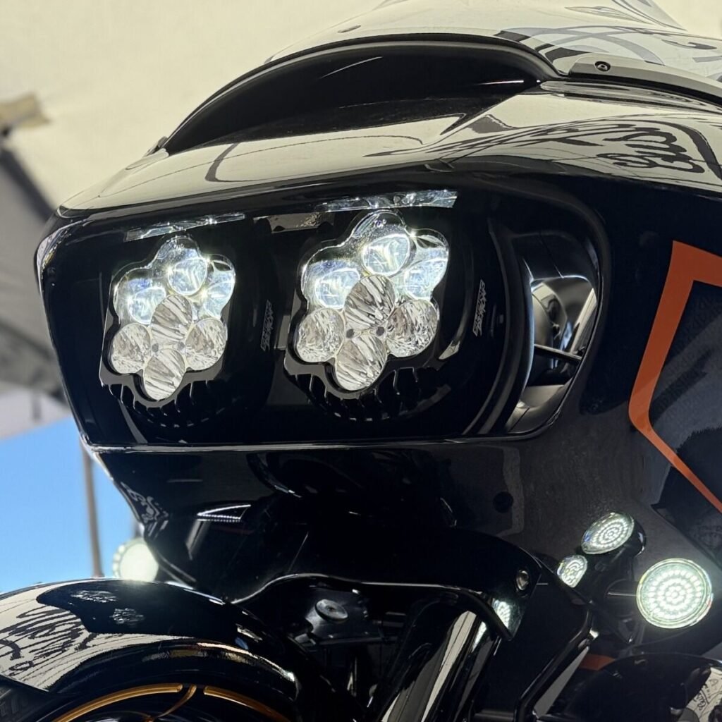 The Custom Dynamics Shark Demon 2 headlight assembly on a clean, white background showing its dual projectors.