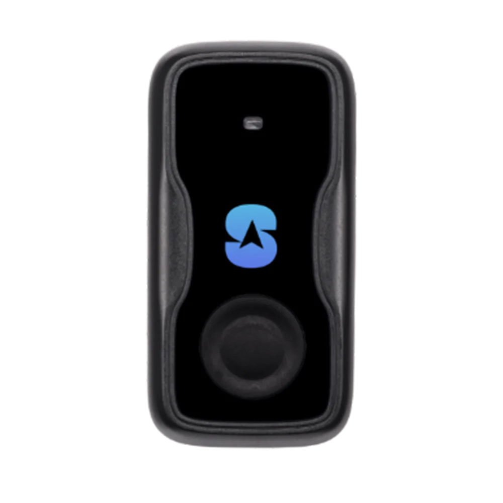 The compact Spytec GPS Motorcycle Tracker unit held in hand to show its concealable size.