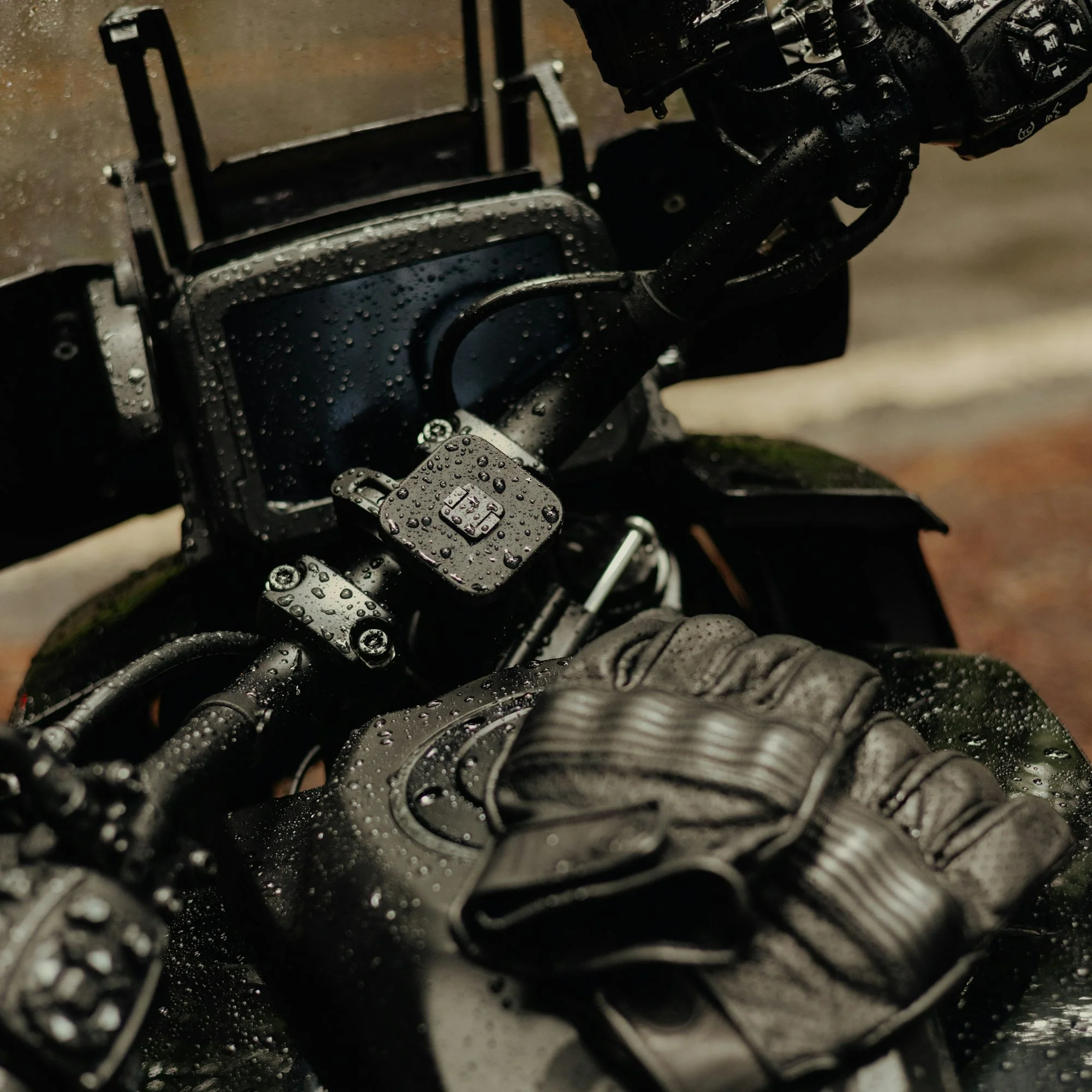 Detail view of the integrated vibration isolator elastomers on the underside of the Peak Design Motorcycle Bar Mount.